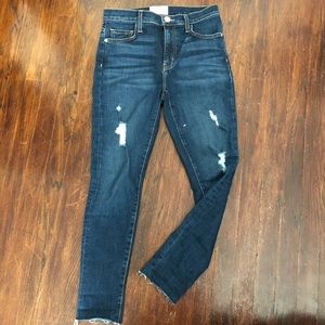 Distressed denim jeans